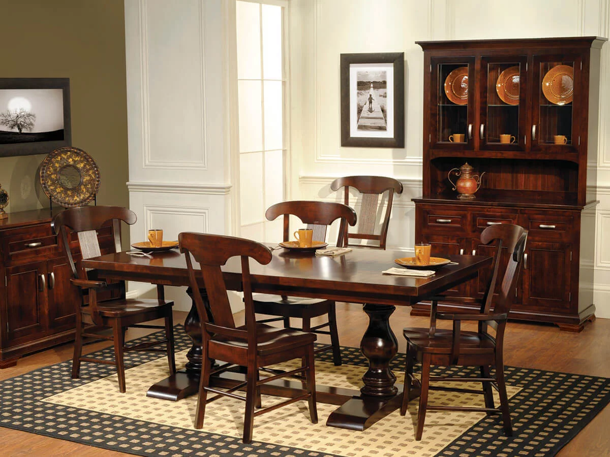 The Holly Dining Set showcases a beautiful double pedestal table with matching chairs and china cabinet in a contemporary style.